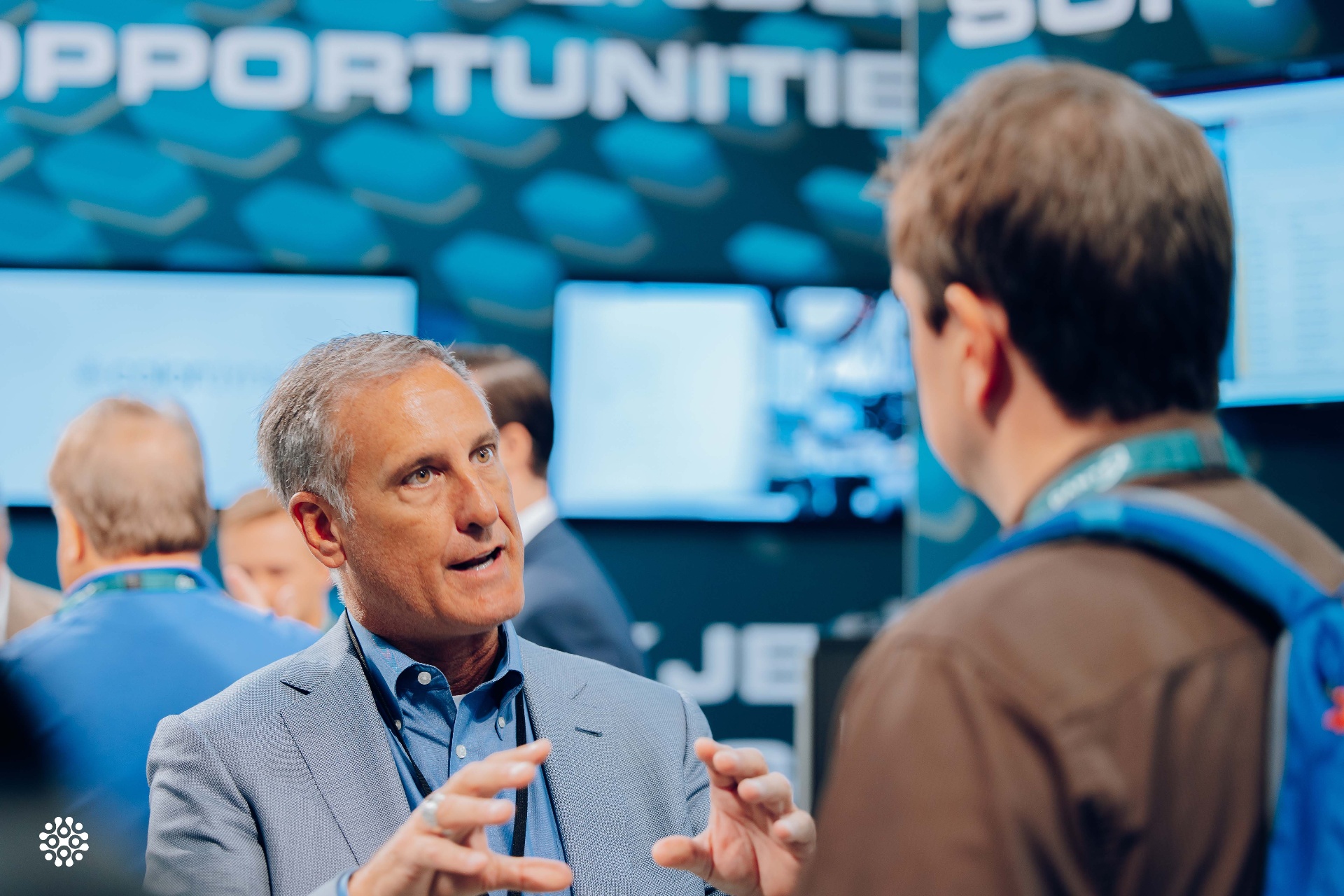 Colordyne team member discussing inkjet opportunities with a customer at a trade show