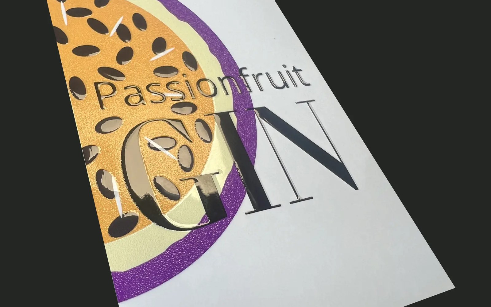 Crook's Passionfruit gin label with raised high-build tactile varnish over the fruit artwork